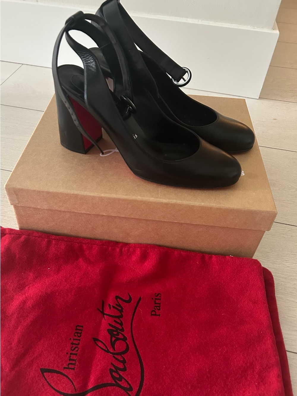 Christian Louboutin Black Leather Slingback Pumps with Red Soles